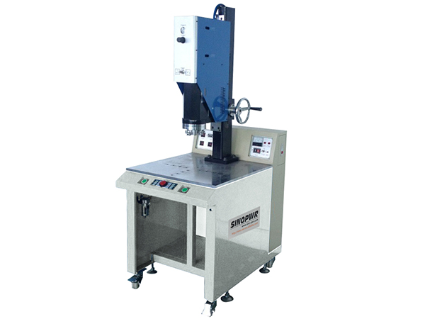Integral ultrasonic plastic welding machine